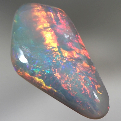 SOLID SEMI BLACK OPAL Bright reds roll over green and blue. SEE VIDEO